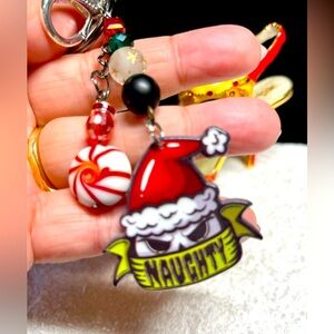 💋naughty grinch theme, zipper pull or purse bling-green.Christmas colors